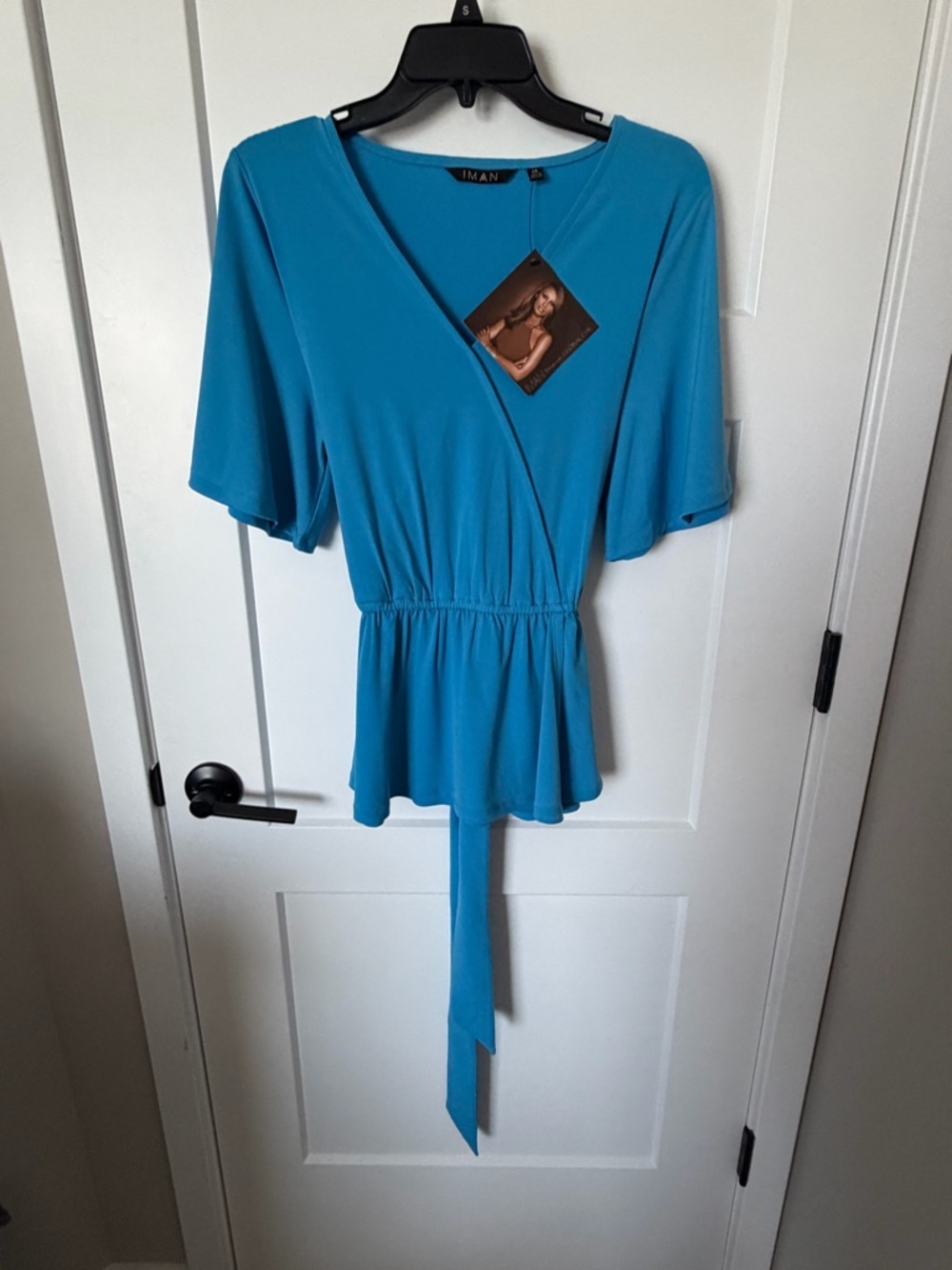 NWT: IMAN Blue Wrap Peplum Top with Tie Waist